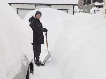 Gui Shovels Snow