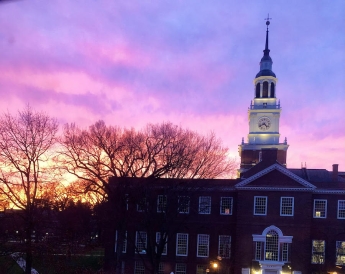 Baker Tower in front of a vivid sunset