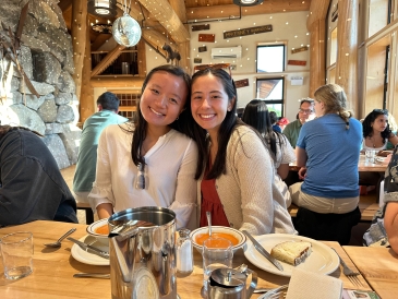 My friend Danny and I smile for the camera while enjoying our home baked pretzel bread and tomato soup.