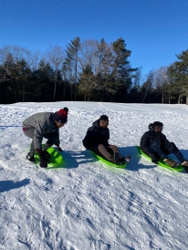Dartmouth students skiing at the golf course