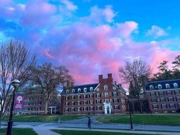 Pink and blue sunset taken from Fahey Hall looking across to Allen House dorms