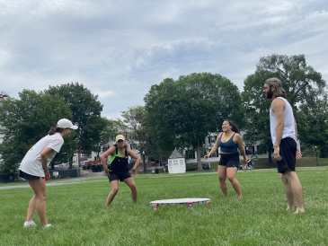 Spikeball game on the Green