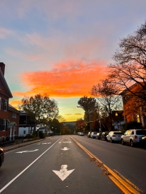 orange sunset taken at the crosswalk on West Wheelock street