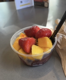 An açai bowl from Collis with strawberries and mangoes.