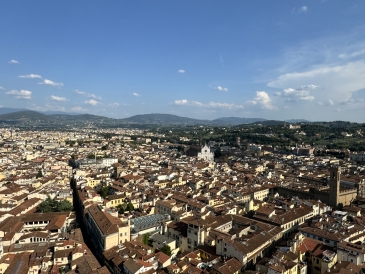 A view of Florence from the top of the Duomo. In the distance, you can see the Basilica of Santa Croce. 