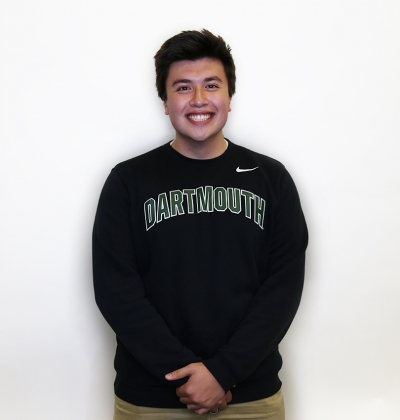 Male student smiling for portrait