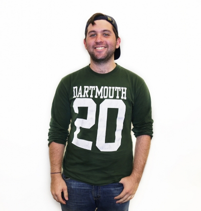 Student smiling for a portrait wearing Dartmouth t-shirt