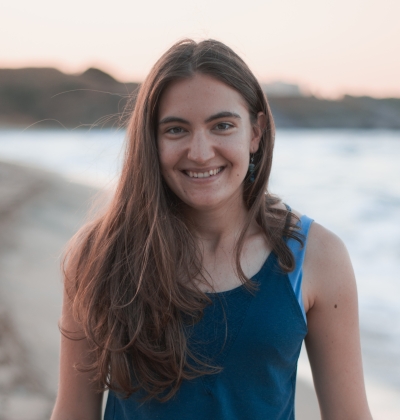 a headshot picture of Kalina in a blue top