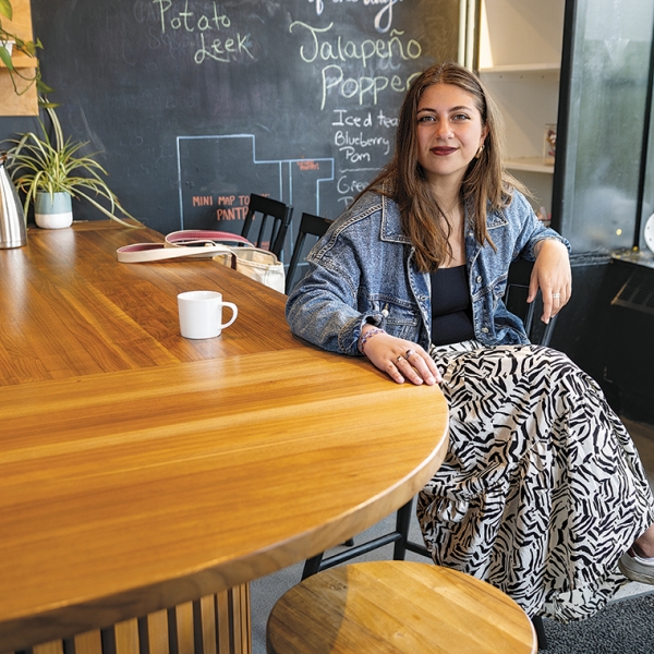 A photo of Armita Mirkarimi '25 sitting in The Nest 