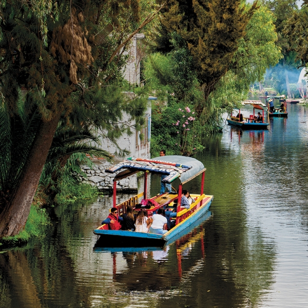 A photo of boats at Xochimilco Ecological Park and Plant Market in Mexico