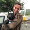 Topher holding his puppy