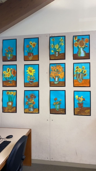 A picture of sunflower paintings at Hanover's Howe Library