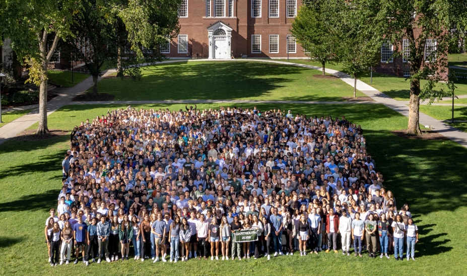 The official class photo of the Class of 2026 on the lawn in front of Baker Library
