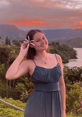 Liliana standing in front of a vista on Hawai'i