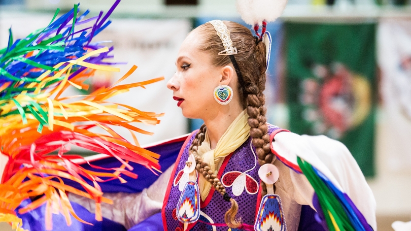 Photo of a student during the annual Powwow event