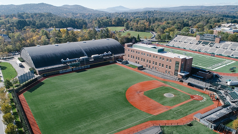 A photo of Dartmouth's baseball field with the mountains in the background