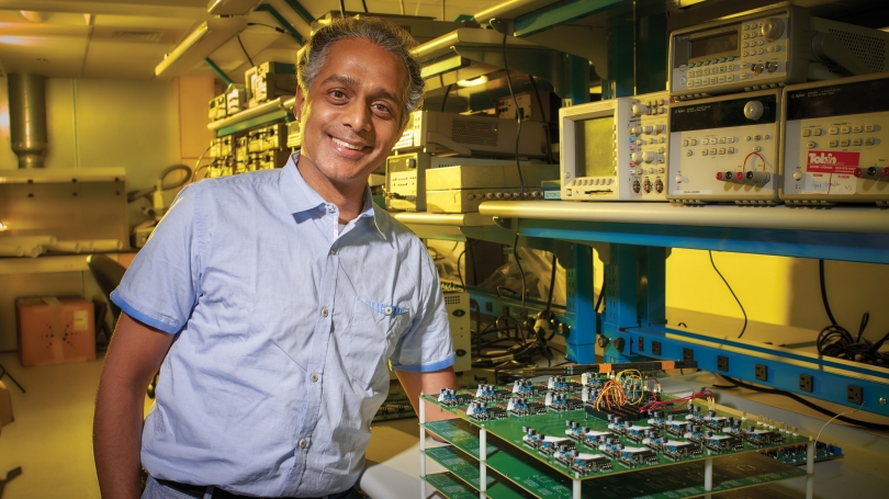 “I love the sizzle in the brain created by an invention that solves a problem you have been working on intensely,” Professor Rahul Sarpeshkar says. (Photo by John Sherman)