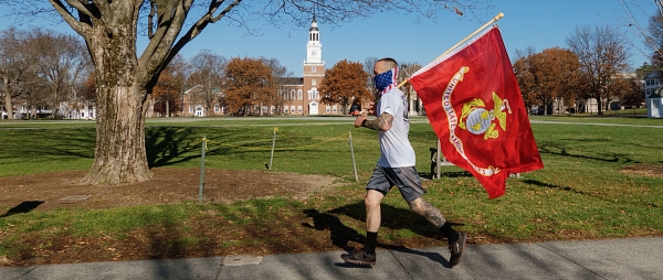 A photo of Jason Mosel, a Marine Vet who ran 100 miles around campus, in 5 mile laps in honor of the 245th Marine anniversary and Veteran's day.