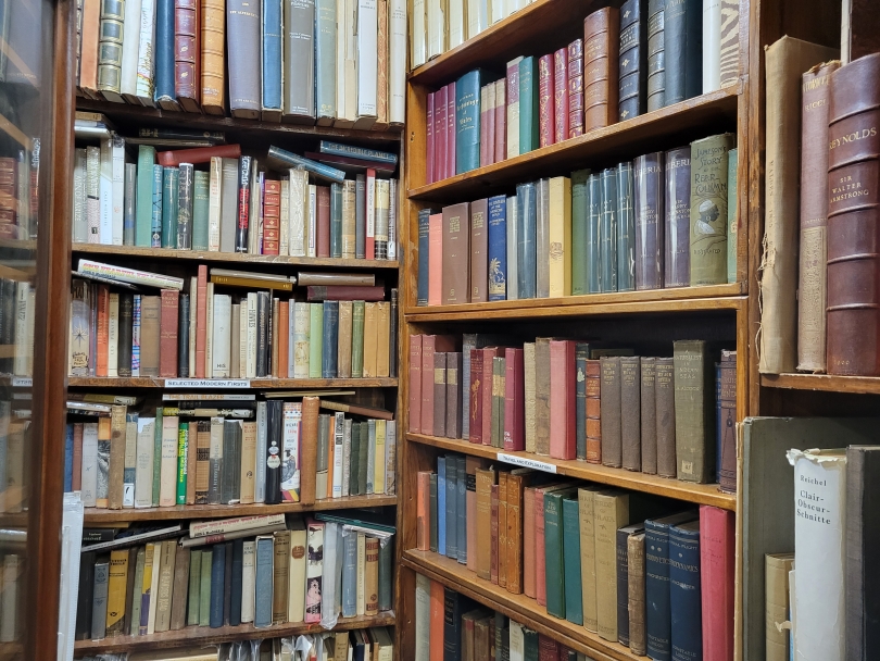 Many old books on shelves. Many old books on shelves.
