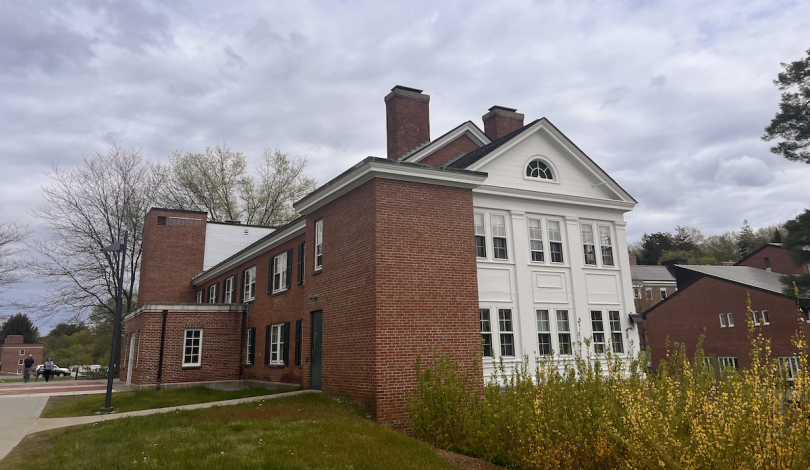 Bulding with red brick and white wood exterior, where the blogger's lab is situated.
