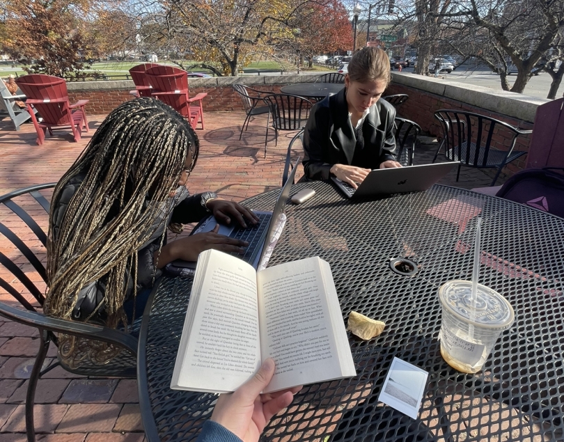 a group of Dartmouth students sitting on Collis porch