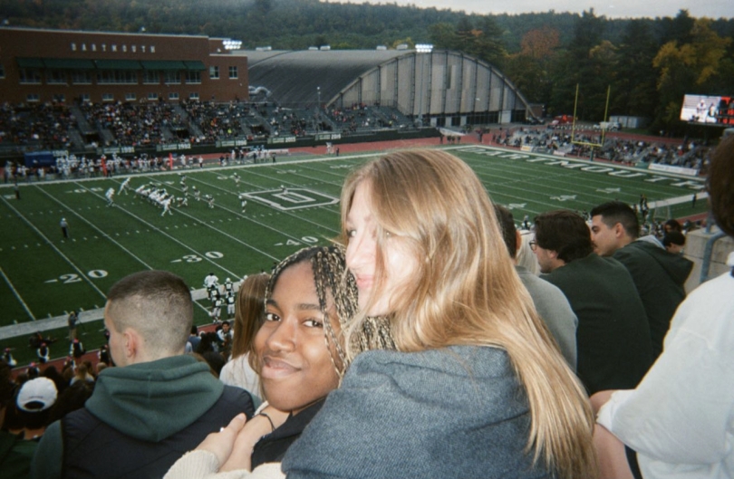 two friends at a football game