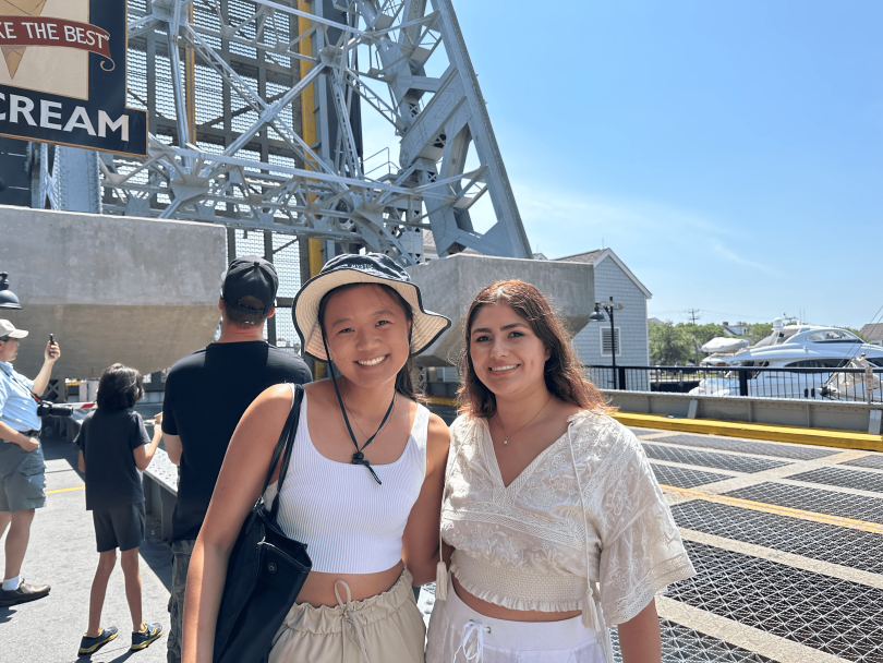 Adri and I smile for a picture by the Mystic Drawbridge on a sunny day.
