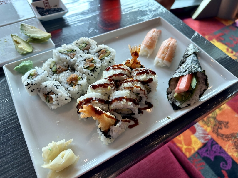 A plate of assorted sushi 
