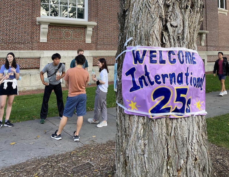 A welcome sign for the Dartmouth class of 2025 pasted on a tree