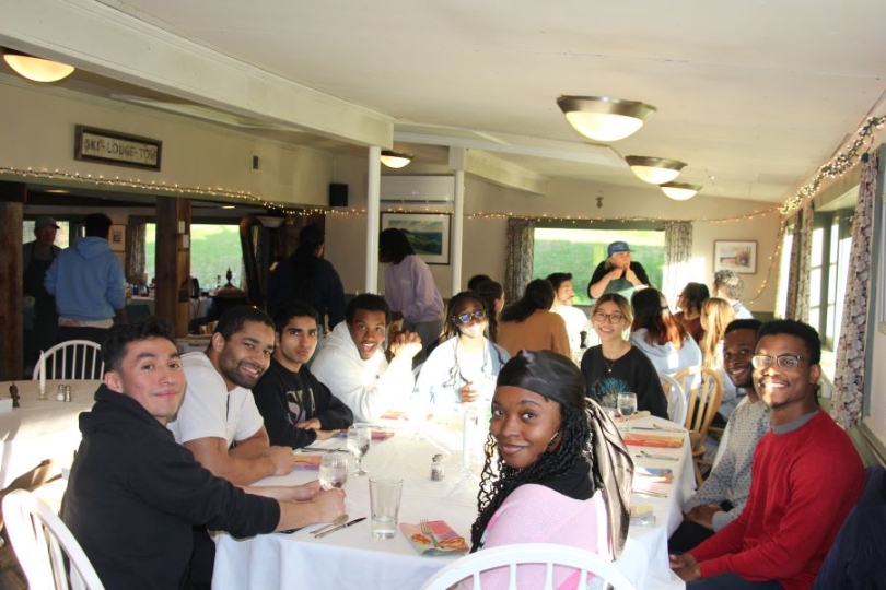 Dinner time! A picture of Pathways Scholars sitting down for Dinner.