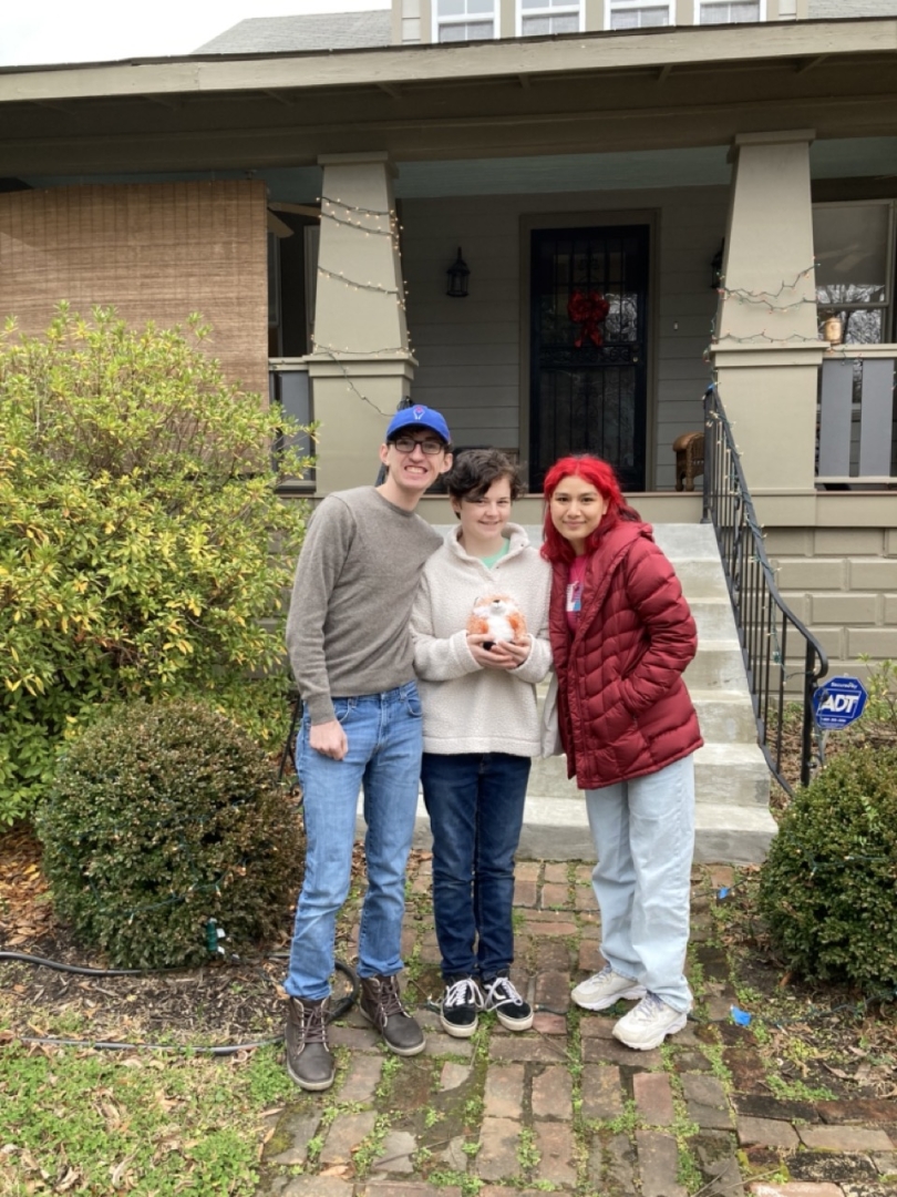 Me, Spencer '23, and my best friend Mercedes standing in front of our Memphis house