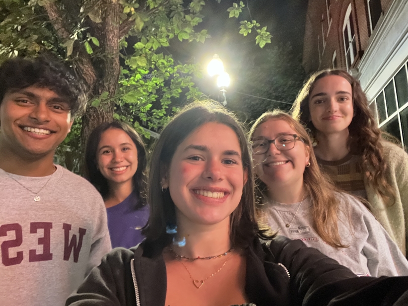A selfie of me, Lauren, with my friends Samay, Maggie, Clara, and May standing outside in downtown Hanover.