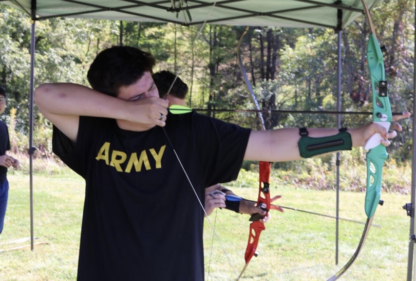 Here's me already a part of Dartmouth's Archery Club! Gabe Gilbert shooting a bow