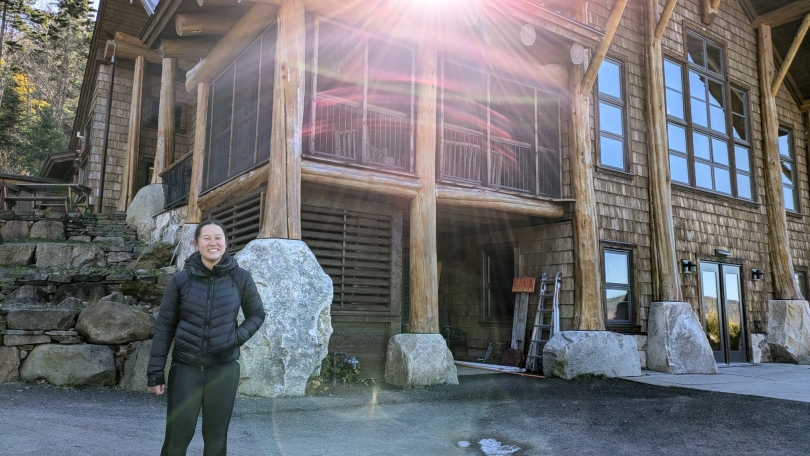 This is my friend in front of the Moosilauke Ravine Lodge to give a size comparison for how large the building is. It is quite large thanks to the upper floor having a massive ceiling.