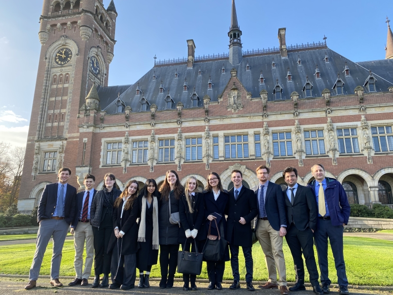Fellows pose in front of the International Court of Justice Peace Palace