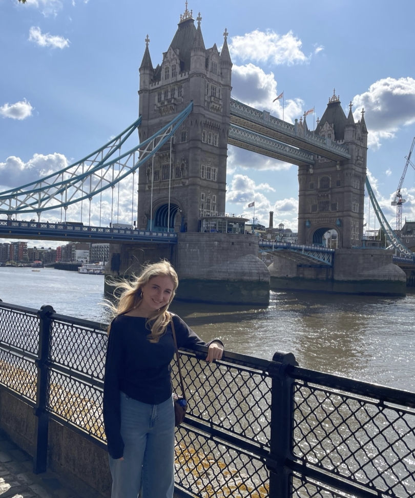 A girl in front of the London Bridge