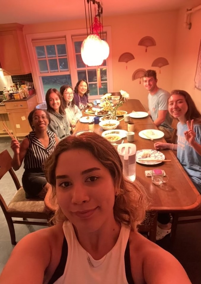 Feray '23 taking a selfie during a dinner at the Chinese Language House