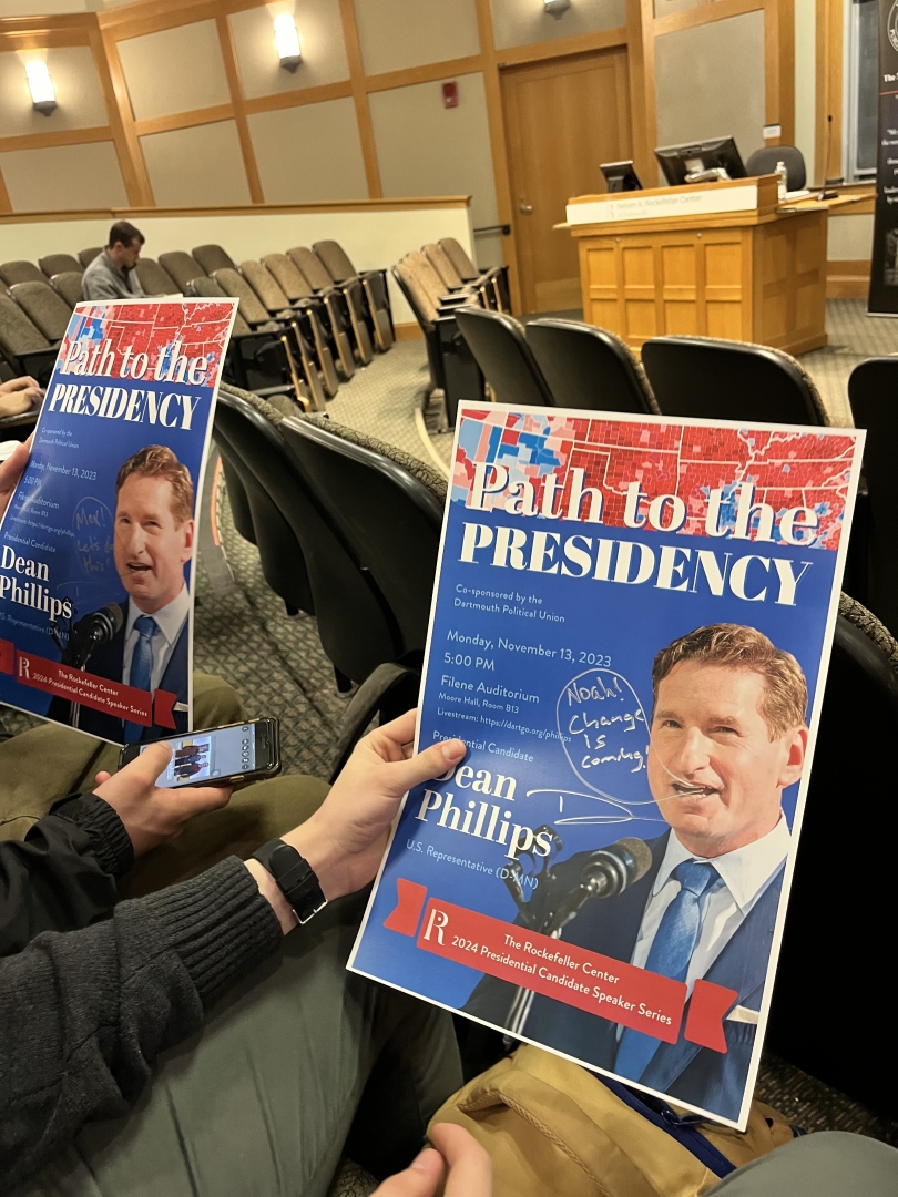 An image of two Dean Phillips event posters, signed by the Representative