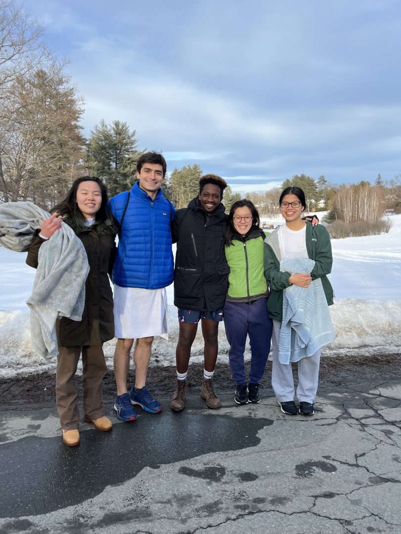 Diana and friends standing in front of Occom Pond after completing the Polar Bear Plunge