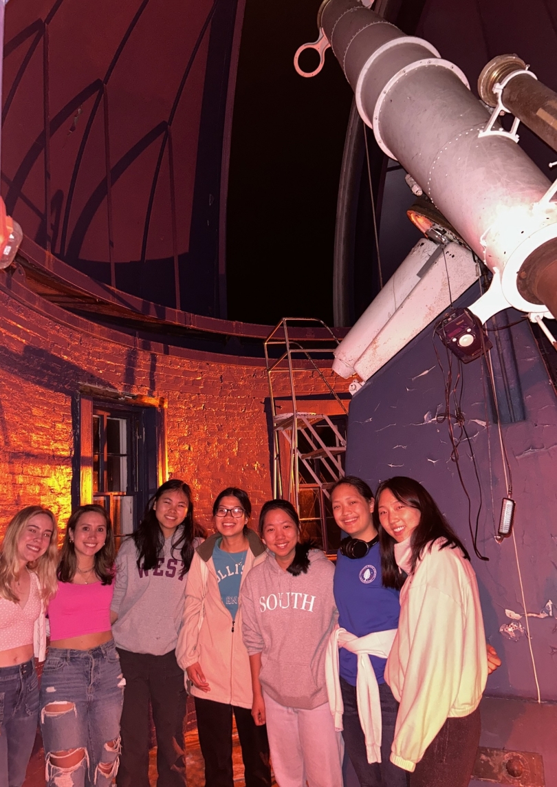 WISP members pose in front of big telescope at Shattuck Observatory