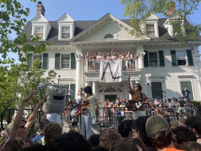 An image of Keggy the Keg dancing on stage at a concert at the annual Dartmouth Phi Delt Block Party on Frat Row