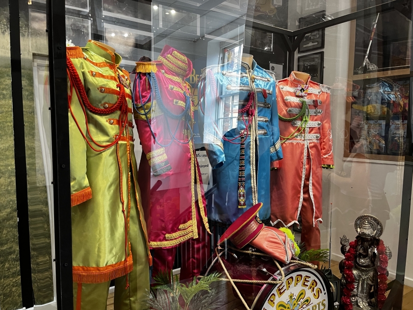 An image of the Beatles' Sgt. Peppers outfits