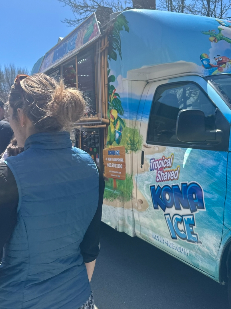 A Kona Ice truck parked in front of the 1953 Commons dining hall. 