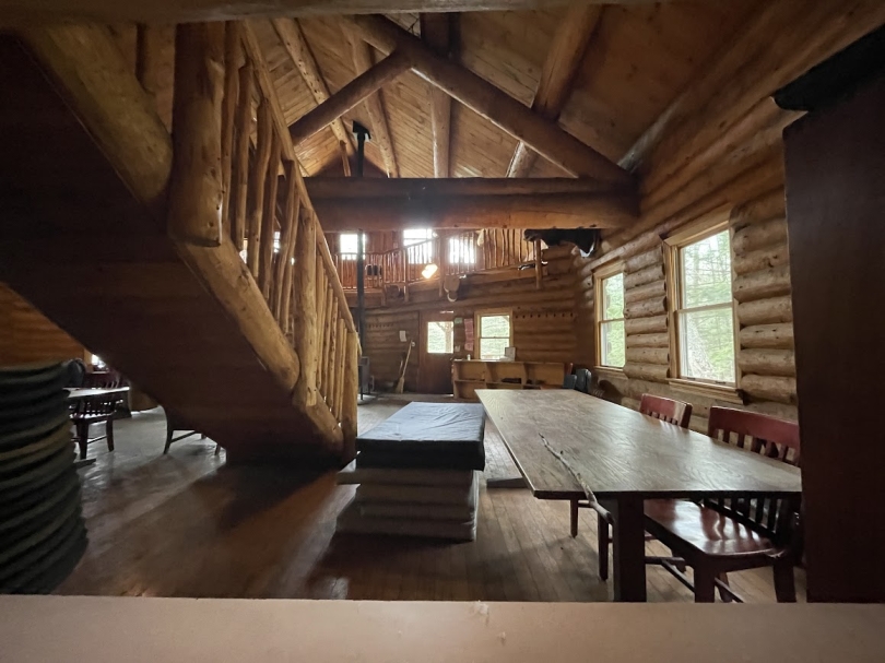 a photo of the inside of the cabin as seen from upstairs
