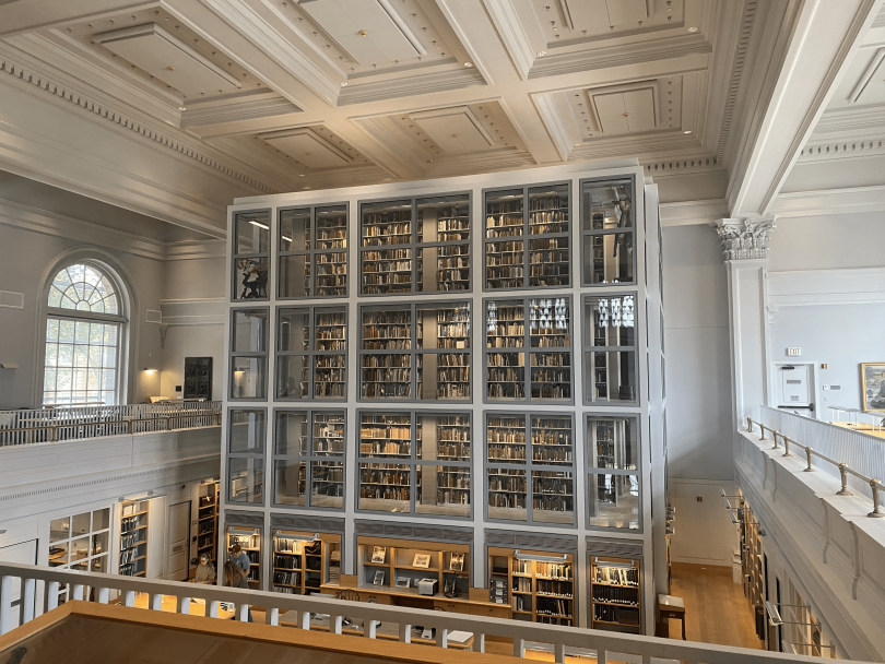 an inside view of the Rauner Special Collections Library, a large glass case full of books