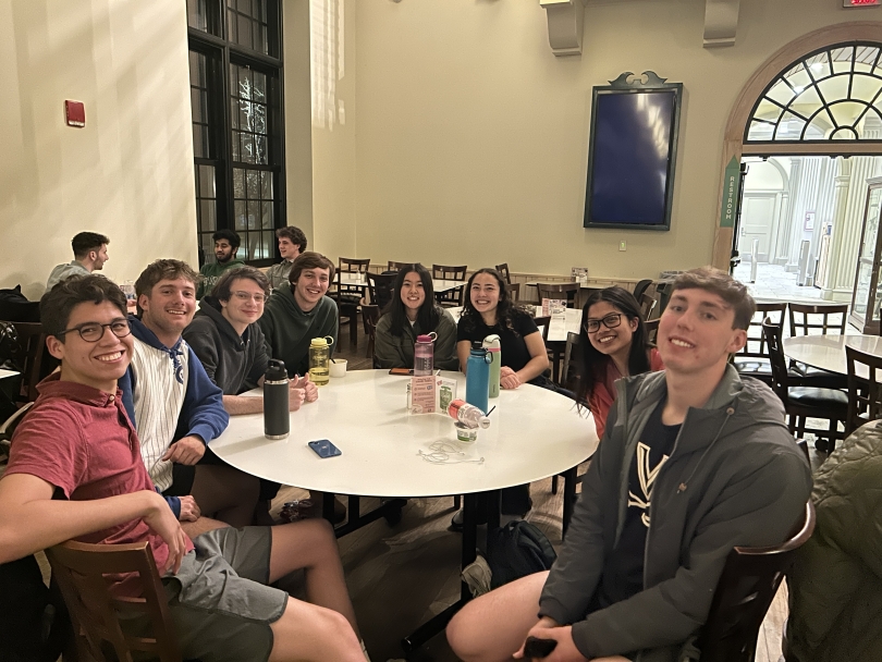 A group of students sit in a dining hall