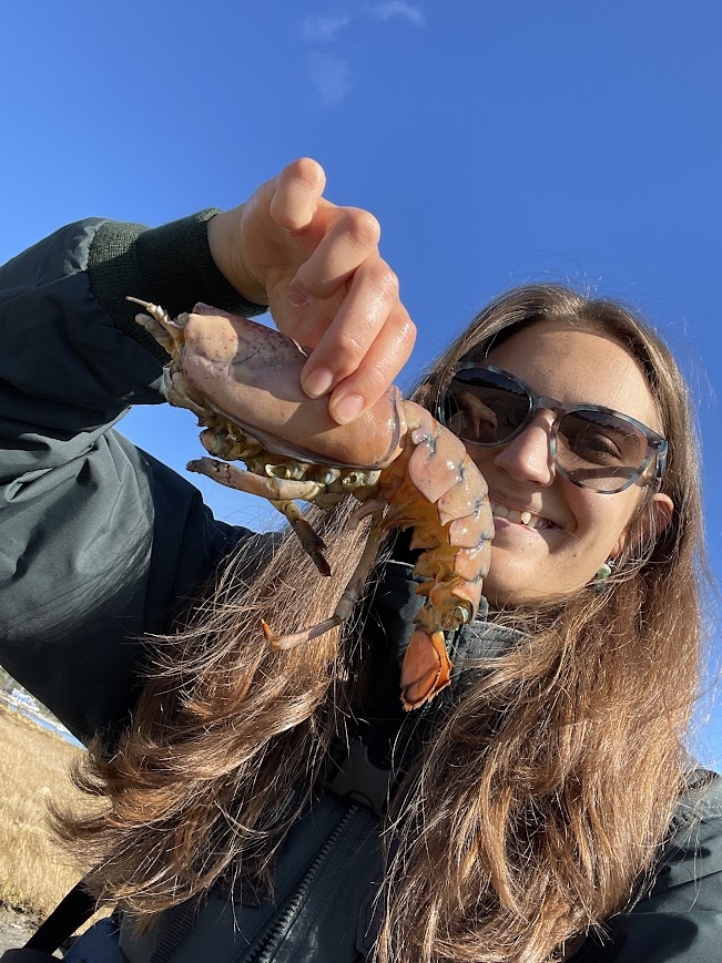 an image of Kalina holding a dead lobster in her hand 