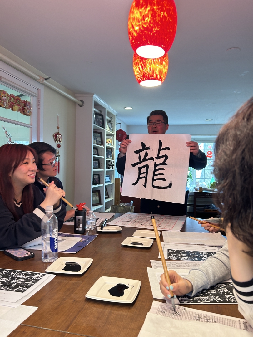 Professor Zhang gives calligraphy demonstration to students