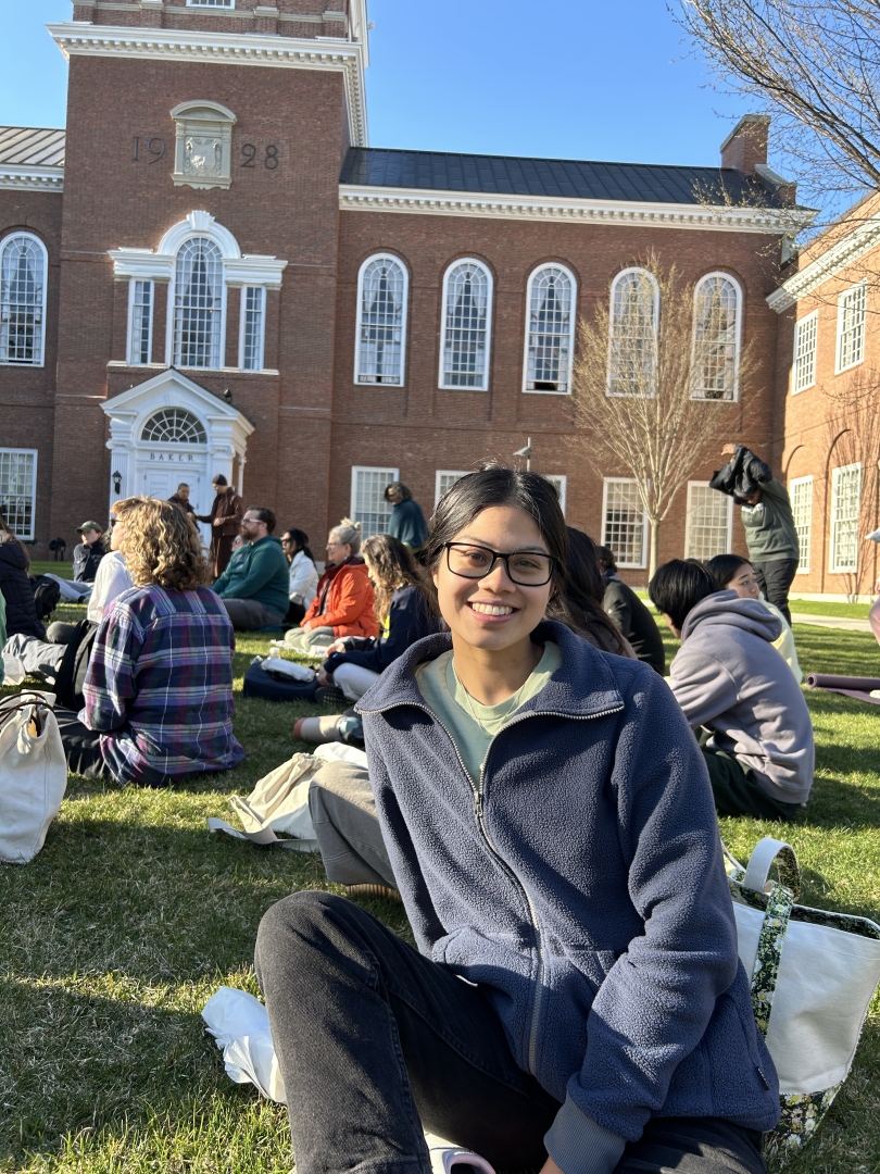 Diana '23 eats a vegetarian sandwich as part of the mindful eating portion of the monastic retreat