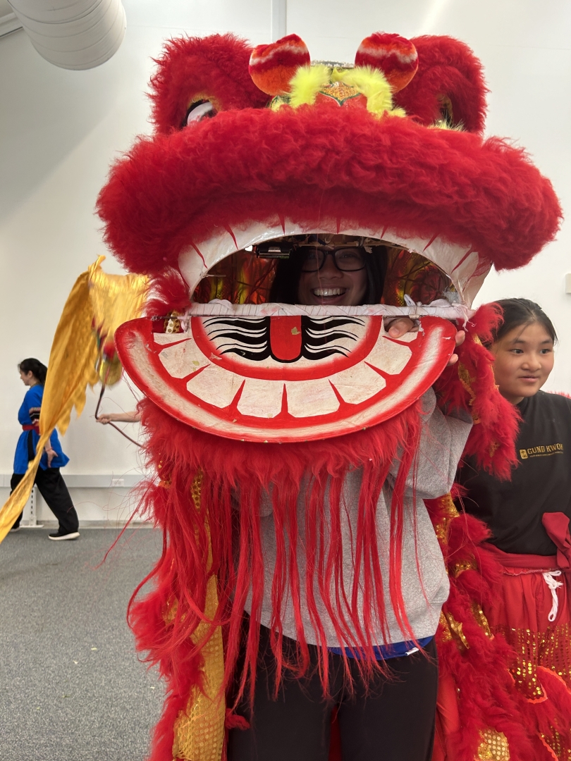 Diana '23 trying on the lion head